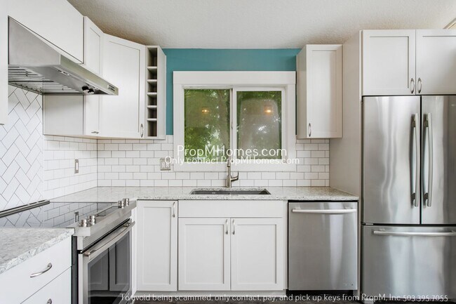 Foto del edificio - Updated 3-Bedroom Gladstone Home with Bonus Office Space!