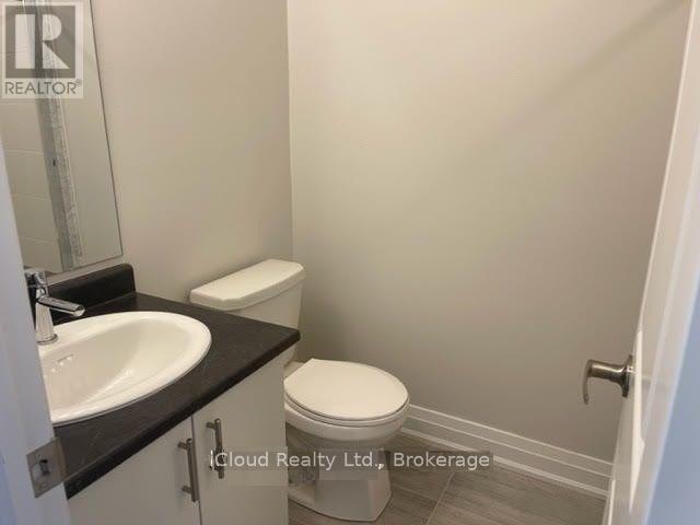 Photo du bâtiment - 33 Wild Rose Gardens