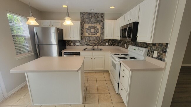 Building Photo - Exclusively Offered By Muse Realty Rentals, LLC