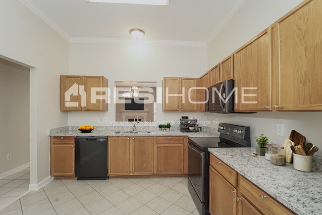 Foto del edificio - 6335 Day Lilly Ln