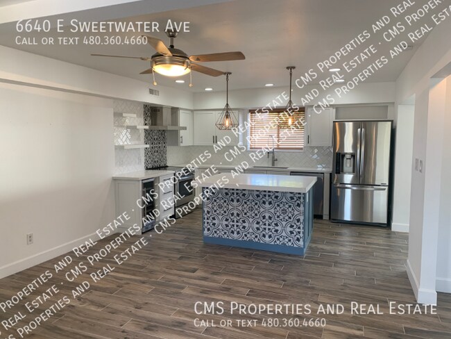 Building Photo - 6640 E Sweetwater Ave