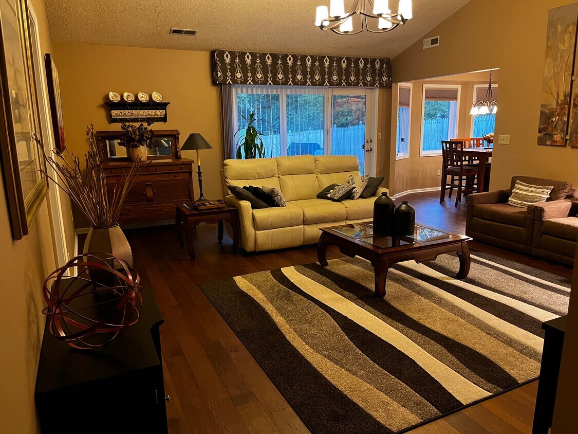 The front door opens to a foyer and this great room. - 1400 Elm St