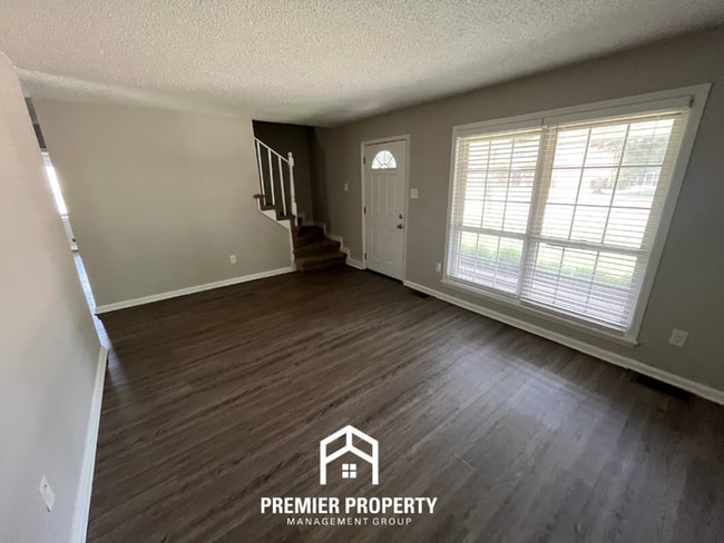 Photo - Spacious 4BR/2BA Home in 38118 | Hardwood Floors & Large Fenced Backyard