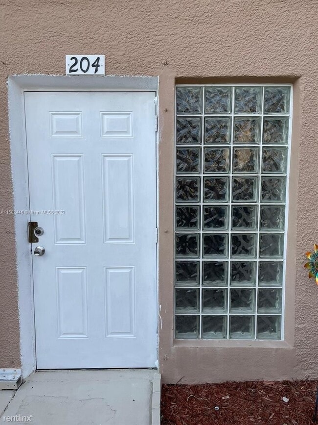 Building Photo - 3 br, 2.5 bath House - 8450 SW 154th Circl...