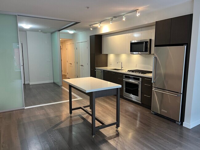 Building Photo - 302-384 E 1st Avenue