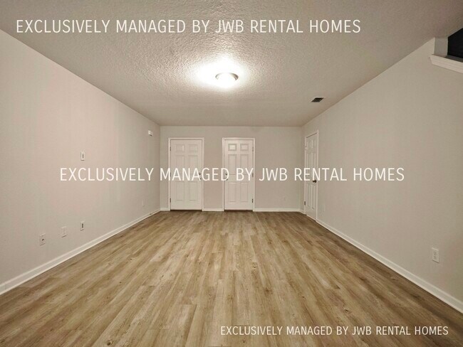Building Photo - 7820 Playschool Ln