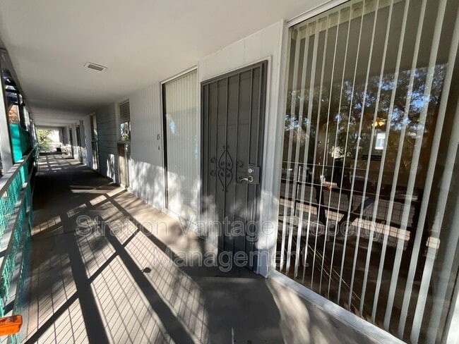 Photo - 6936 E 4th St Apartment