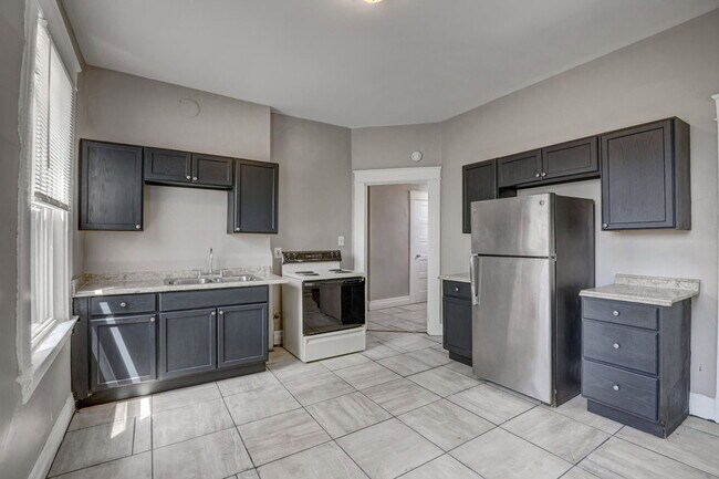 Building Photo - 1214 Iliff Ave