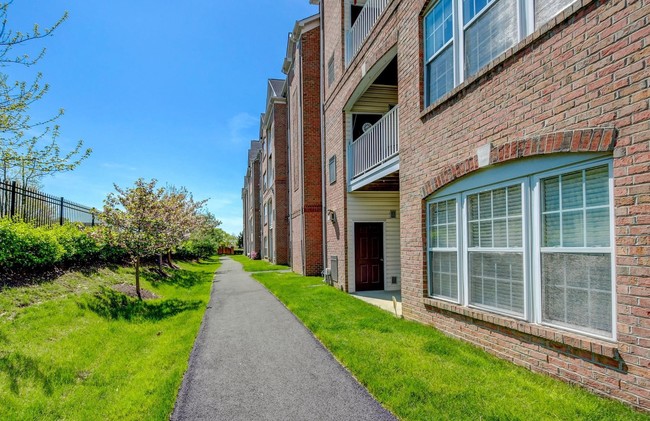 Walking path just off the back patio. - 9509 Kingscroft Terrace