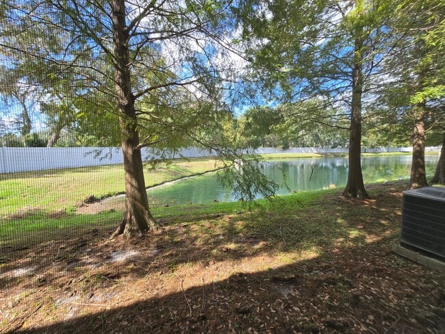 Building Photo - Great Town Home in Gated Community with Pool and Pond View