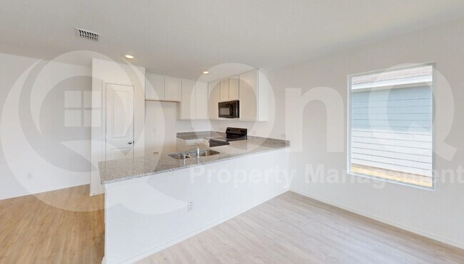 Foto del edificio - 5847 Rock Maple Dr