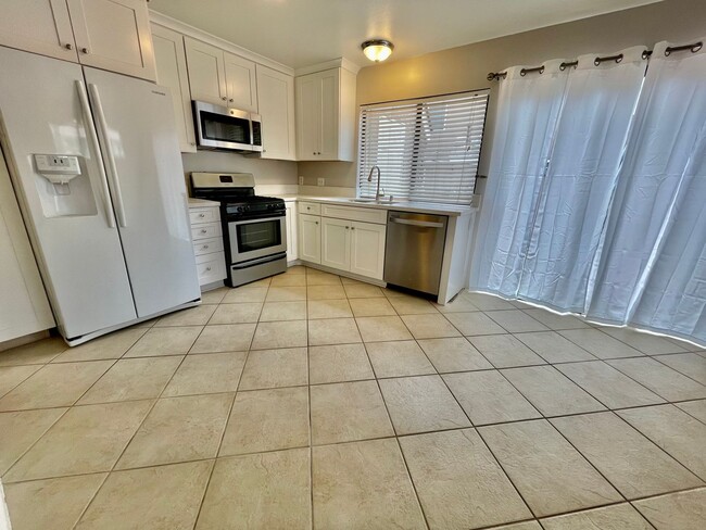 Building Photo - Discover the Essence of Irvine Living!