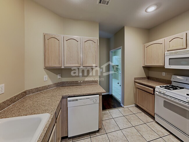 Building Photo - 8701 Red Brook Dr Unit 204