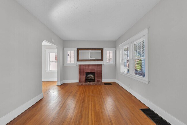 Building Photo - NORWOOD – Stunning Old-World Charm with Modern Comforts