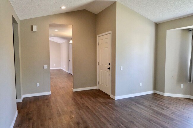Building Photo - Centrally Located 4-Bedroom Home with Spac...