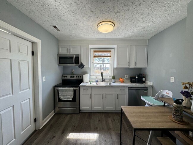 Building Photo - Welcome to this charming Cape Cod style ho...