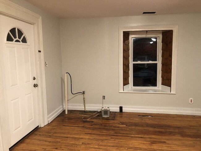 Kitchen with back door entrance. Washer and dryer hookup - 1 Grant Ln