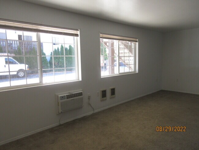 large windows, wall heater, wall AC in great room - 12903 E Sprague Ave