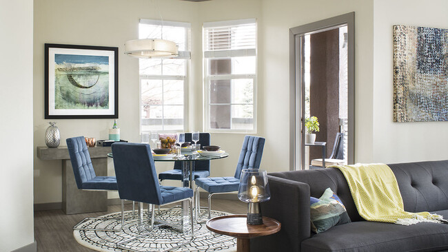 Apartment Dining room with wood floors. - Griffis Belleview Station