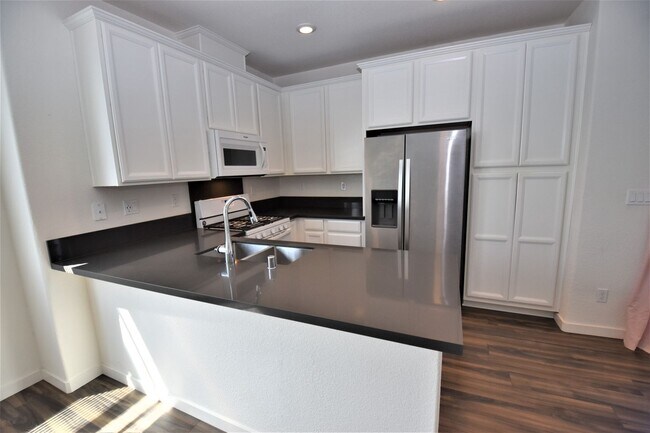 Photo - 3998 E Commerce Way Townhome