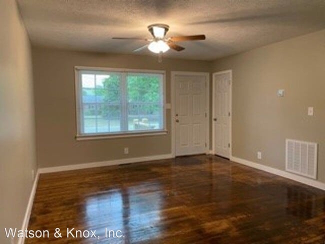 Building Photo - 3 br, 1 bath House - 124 Camelia Drive