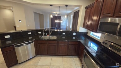 Building Photo - 6771 W Miner Trail