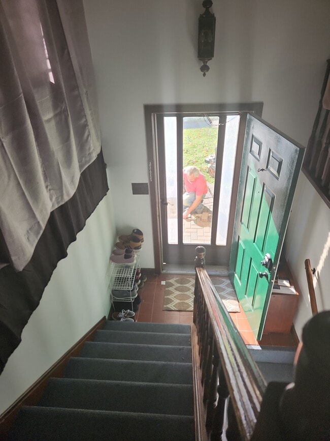 Stairs to upper apartment - 2116 Thaler Ave