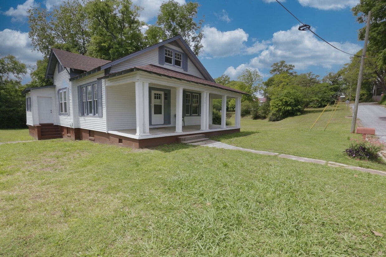 Primary Photo - Spacious 4-Bedroom Home with Modern Upgrad...