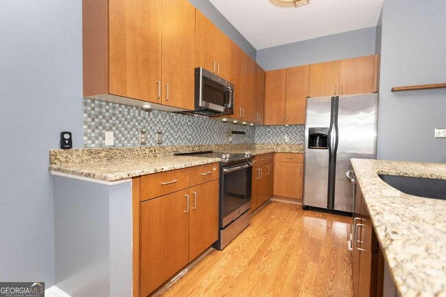 Building Photo - 711 Cosmopolitan Dr NE