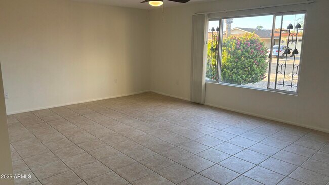 Foto del edificio - 9719 W Rolling Hills Dr