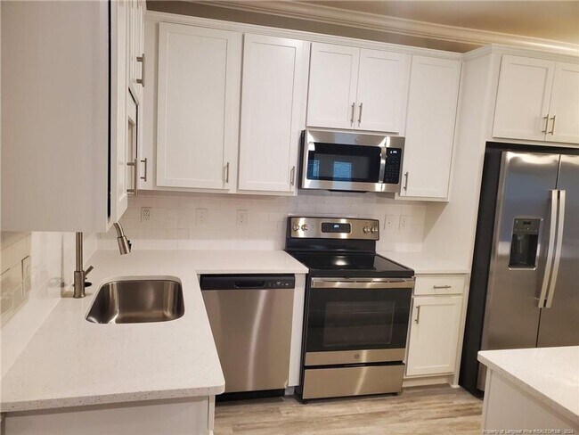 Building Photo - BRAND NEW CONDO!
