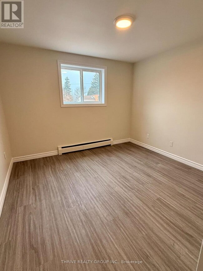 Photo du bâtiment - 1500 Mclarenwood Terrace