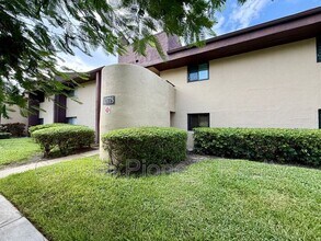 Building Photo - 10775 Village Club Cir