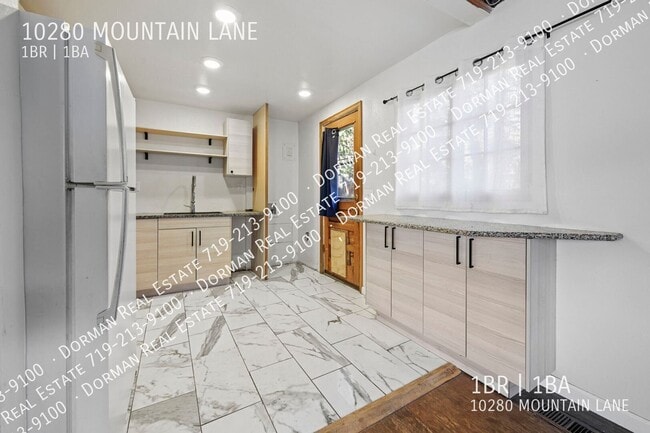 Photo - 10280 MOUNTAIN LANE- House