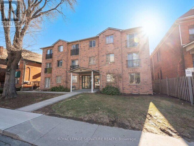 Photo du bâtiment - 28 Victoria Ave N