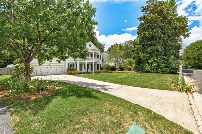 Building Photo - Welcome to this stunning 4-bedroom, 3-bath...