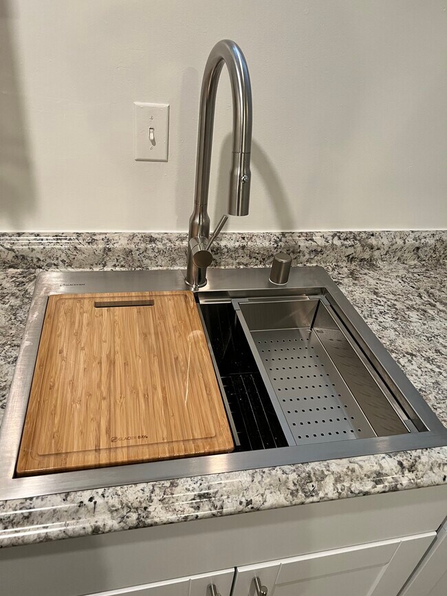 Integrated colander and cutting board option for the sink - 9611 15th Ave NE
