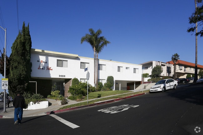 Building Photo - The sun dial palms