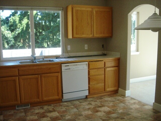 Kitchen with dishwasher - 8906 Corliss Ave N House