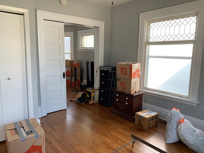 Inside of Bedroom 1 w/ large, pocket door going out into living room - 209 30th Street Dr SE
