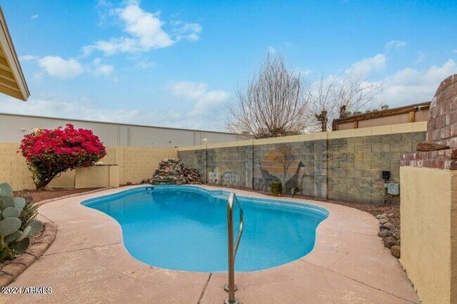 Building Photo - 3408 W Port Au Prince Ln