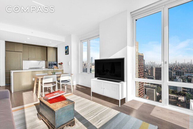 Foto del edificio - Elegant Condo Living with Impressive Views and Exclusive Building Amenities in the Heart of Downt...