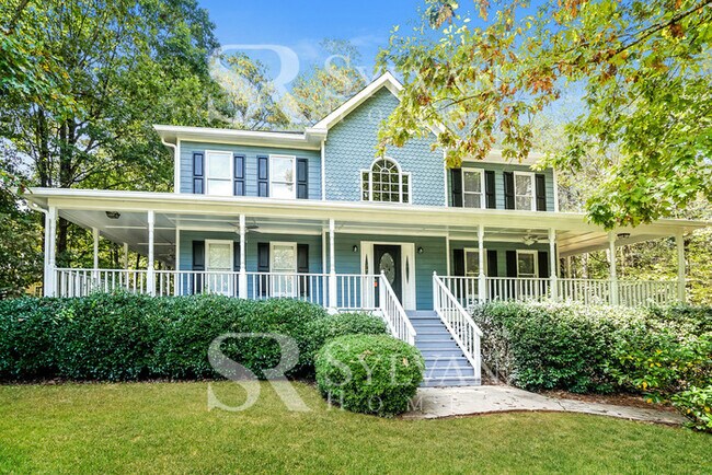 Foto del edificio - The living is easy in this 4 bedroom, 2.5 ...