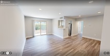 This recently renovated 680 square foot apartment in Alexandria, VA offers a perfect blend of modern comfort and functionality. The open-concept layout maximizes the living space, creating a seamless flow between the kitchen, living, and dining areas. The kitchen boasts sleek white cabinetry, stainless steel appliances, and ample counter space, ideal for culinary enthusiasts.

The spacious bedroom, measuring 230 square feet, features plush carpeting and large windows that flood the room with natural light. Built-in closets provide generous storage options. The bathroom is elegantly appointed with a modern vanity, large mirror, and a tub/shower combination adorned with stylish tile work.

Throughout the apartment, recessed lighting and neutral color palettes create a bright, airy ambiance. The living area is graced with beautiful hardwood flooring, while the bedroom offers cozy carpeting. A sliding glass door in the living room leads to an outdoor space, perfect for enjoying fresh air or morning coffee.

This single-floor dwelling also includes a hallway for easy navigation between rooms. With its thoughtful design and contemporary finishes, this apartment offers a comfortable and stylish living experience in a prime Alexandria location.