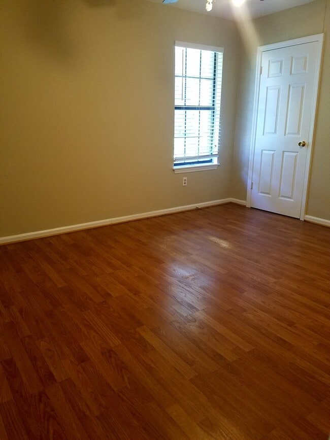 Building Photo - Three Bedroom Brick Home Walking Distance ...