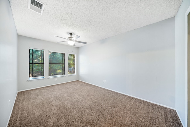 Building Photo - Sign your lease and receive a FREE 50" TV!!!  "Spacious 4-Bedroom Retreat with Fireplace in Charm...