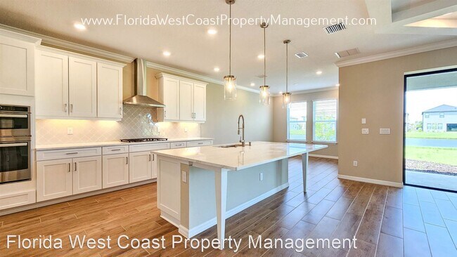 Foto del edificio - 5 br, 4.5 bath House - 10200 Milky Way Cir