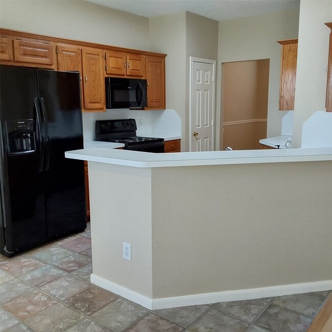 Foto del edificio - 13726 Rocky Bluff Dr