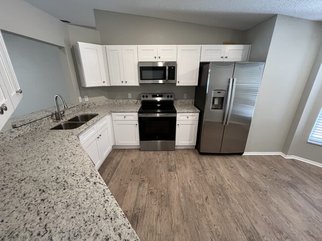 Building Photo - 4014 Ponea Dr