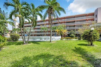 Building Photo - 200 NE 12th Ave